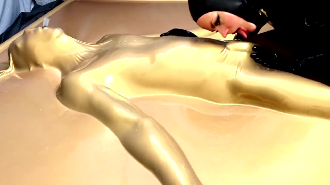 MistressAe Teases and Edges Sub to the Limit in Gold Latex